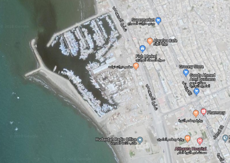 Satellite view showing the fishing port in Hodeidah with the fish market slightly to its right. A second bomb hit the entrance to al-Thawra hospital (bottom right-hand corner on the map).